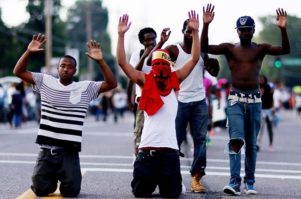 ferguson-hands-up-dont-shoot-protests-2014-nillboard-650